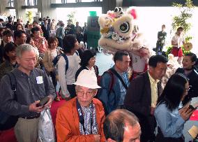 Travelers board China Airlines at Narita